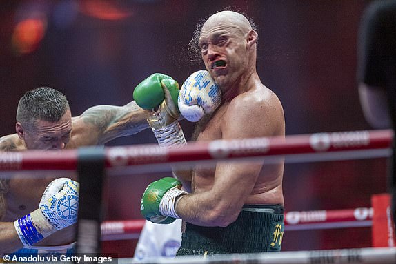 RIYADH, SAUDI ARABIA - MAY 19: Oleksandr Usyk (L) of Ukraine in action against Tyson Fury (R) of United Kingdom during heavyweight boxing world championship fight at Kingdom Arena in Riyadh, Saudi Arabia on May 19, 2024. (Photo by Mohammed Saad/Anadolu via Getty Images)