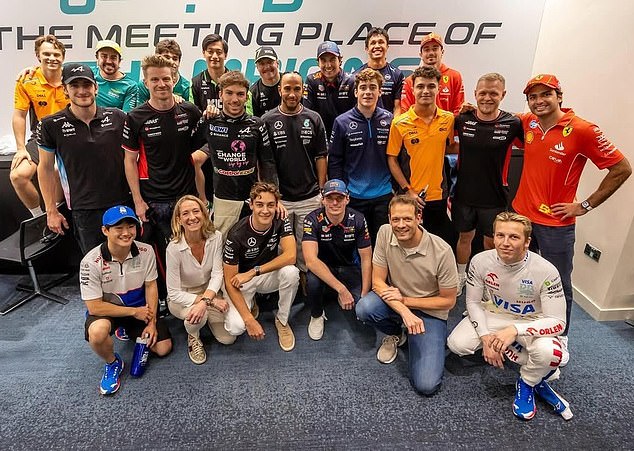 Max Verstappen and George Russell were pictured side-by-side in what can only be described as an awkward end-of-season photograph amid their ongoing feud